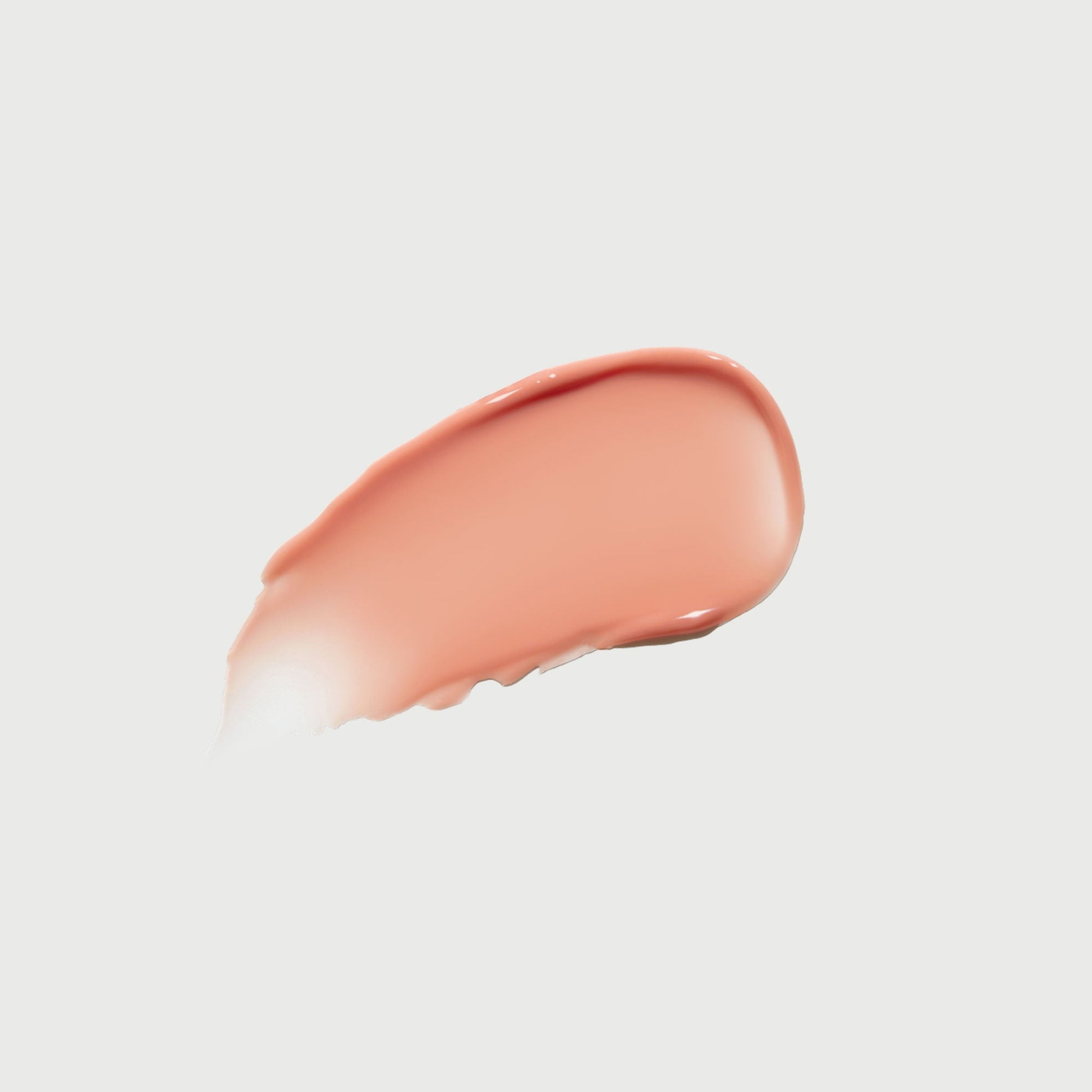 phyto-glow-lip-balm-peach-i8 NATR-10121-Swatch-Phyto-Glow-Peach-bonebkgd.jpg