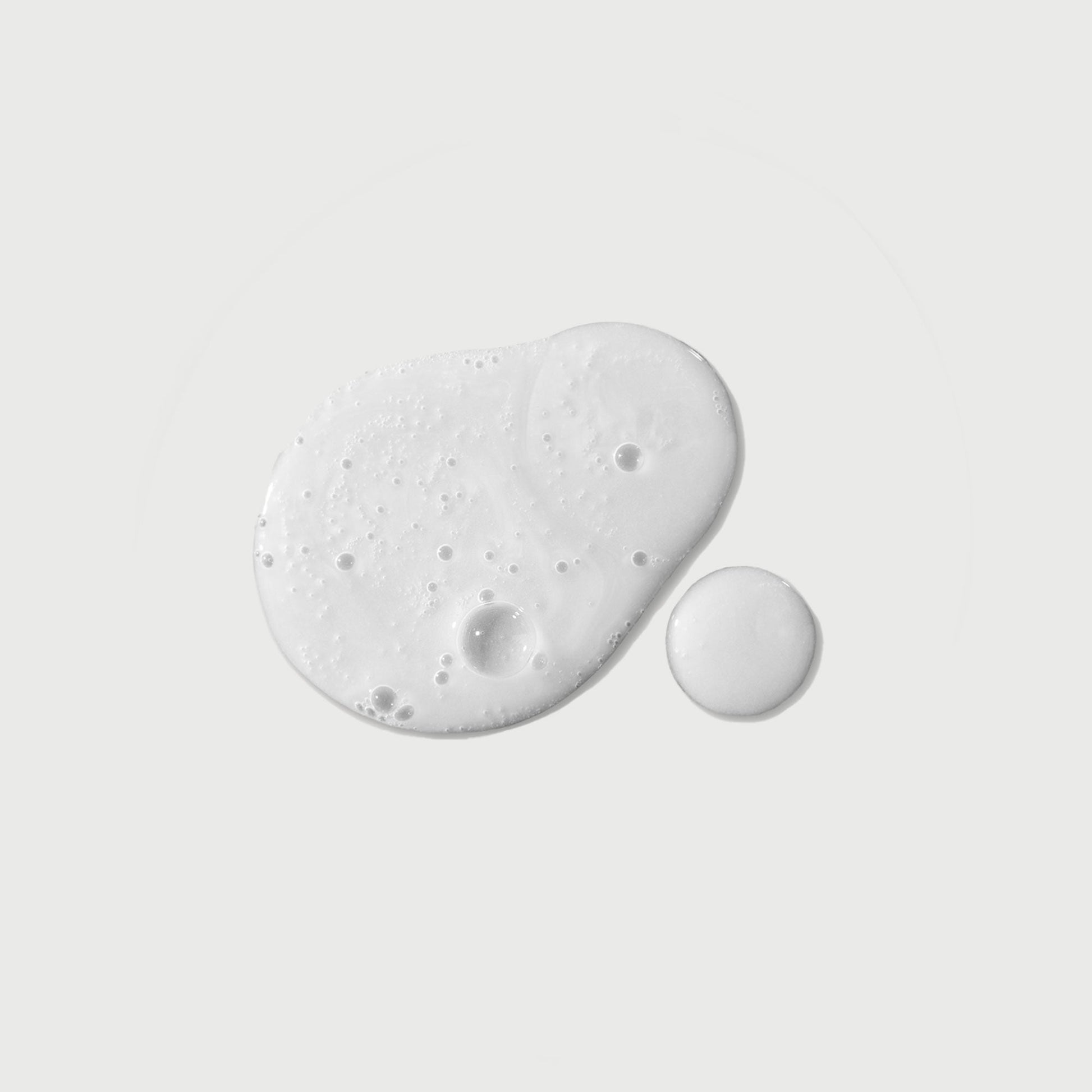 the-purifier-niacinamide-serum-body-wash-t2 NATR-40012-Swatch-The-Purifier-Niacinamide-Serum-Body-Wash-bonebkgd.jpg