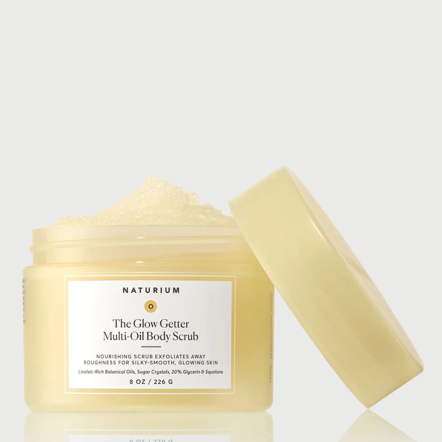 the-glow-getter-multi-oil-body-scrub-z9 NATR-40028-GlowGetter-Multi-Oil-Body-Scrub-Front-CapOff-bonebkgd.webp