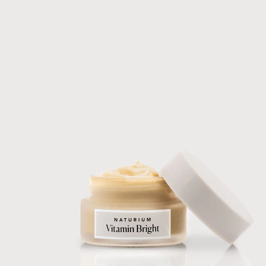 vitamin-bright-illuminating-eye-cream-t0 NATR-VitaminBright_LIGHT_Primary_front_openjar_bone.webp