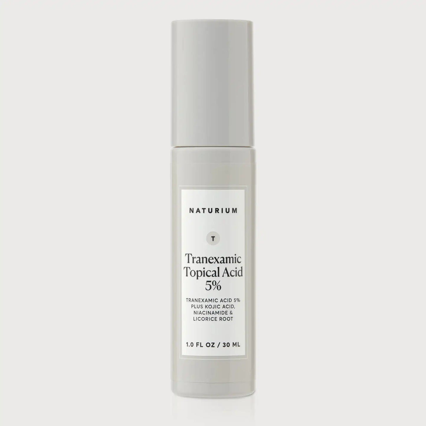 tranexamic-topical-acid-5-m2 Naturium_Tranexamic_Acid_Front_CapOn_Bone_1.webp