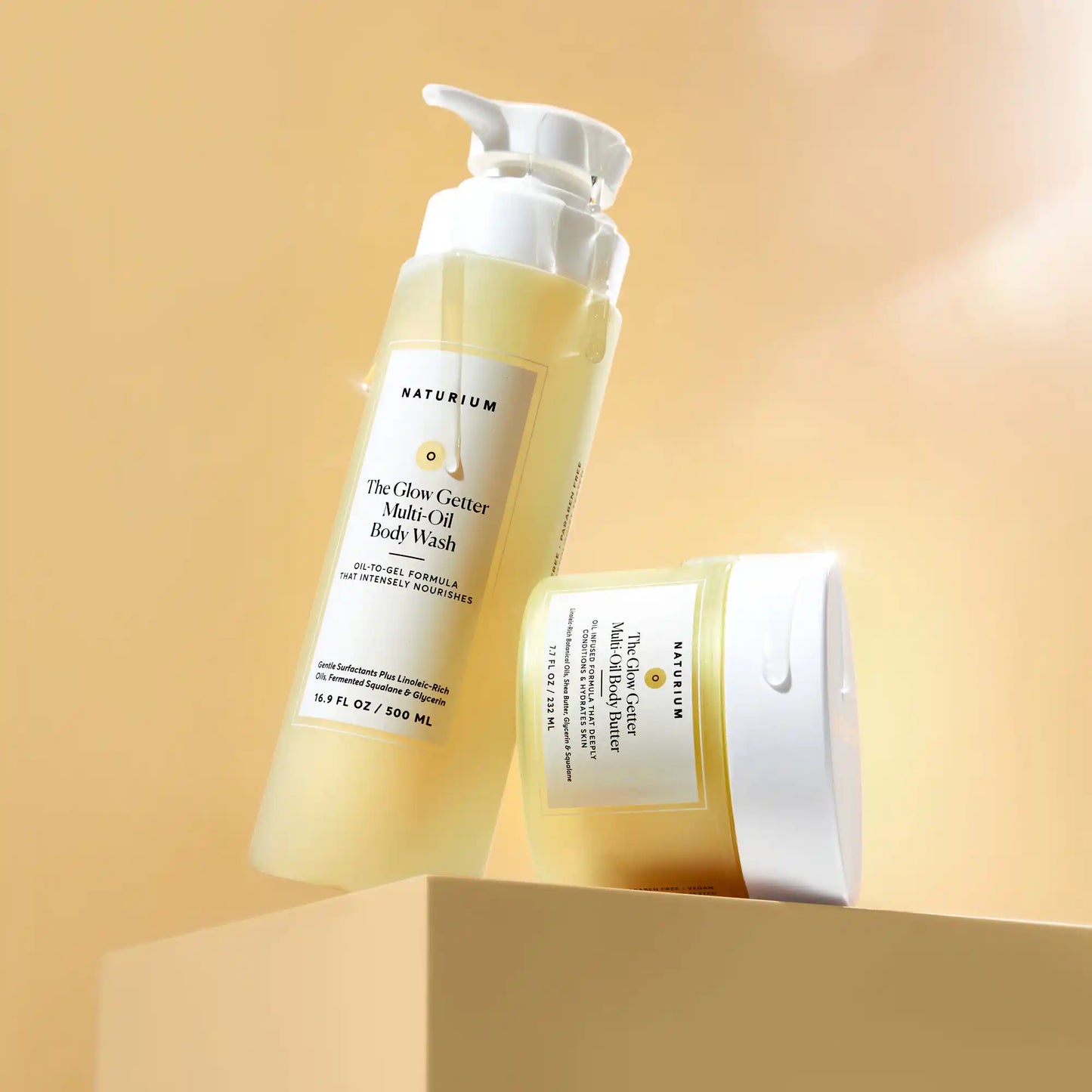 the-glow-all-out-body-bundle-f4 gg-bodybutter_1464-crop_revcolor_FL.webp